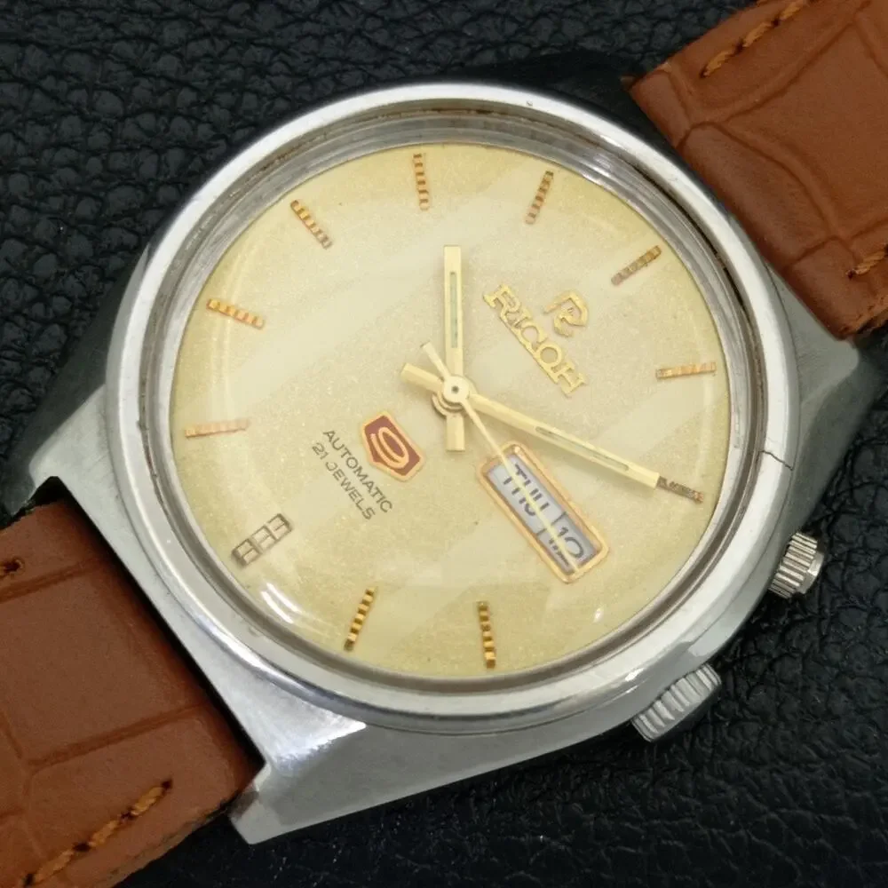 Vintage 1982 Ricoh Automatic Mens Silver Watch W/daydate & Red accents